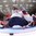 HELSINKI, FINLAND - DECEMBER 30: USA's Brandon Fortunato #52 and Alex Nedeljkovic #31 turn as Switzerland's Timo Meier #28 scores Team Switzerland's first goal of the game during preliminary round action at the 2016 IIHF World Junior Championship. (Photo by Matt Zambonin/HHOF-IIHF Images)

